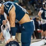 San Marcos linebacker Elijah Bechtel kneels after the team's 42-25 loss to Granite Hills in the Division I title game. Photo via X/Matt Bechtel