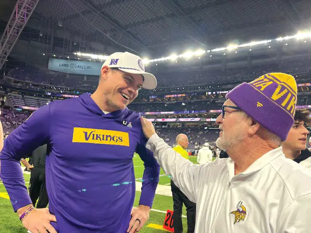 Minnesota Vikings head coach Kevin O’Connell, left, shares a laugh with Don Rizzi, his former principal at La Costa Canyon High, before a recent game. O’Connell’s Vikings play the Los Angeles Rams on Monday night in an NFL wild-card playoff game. Courtesy photo