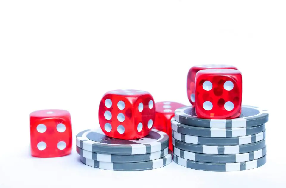 3-red-dices-with-grey-and-white-poker-chips