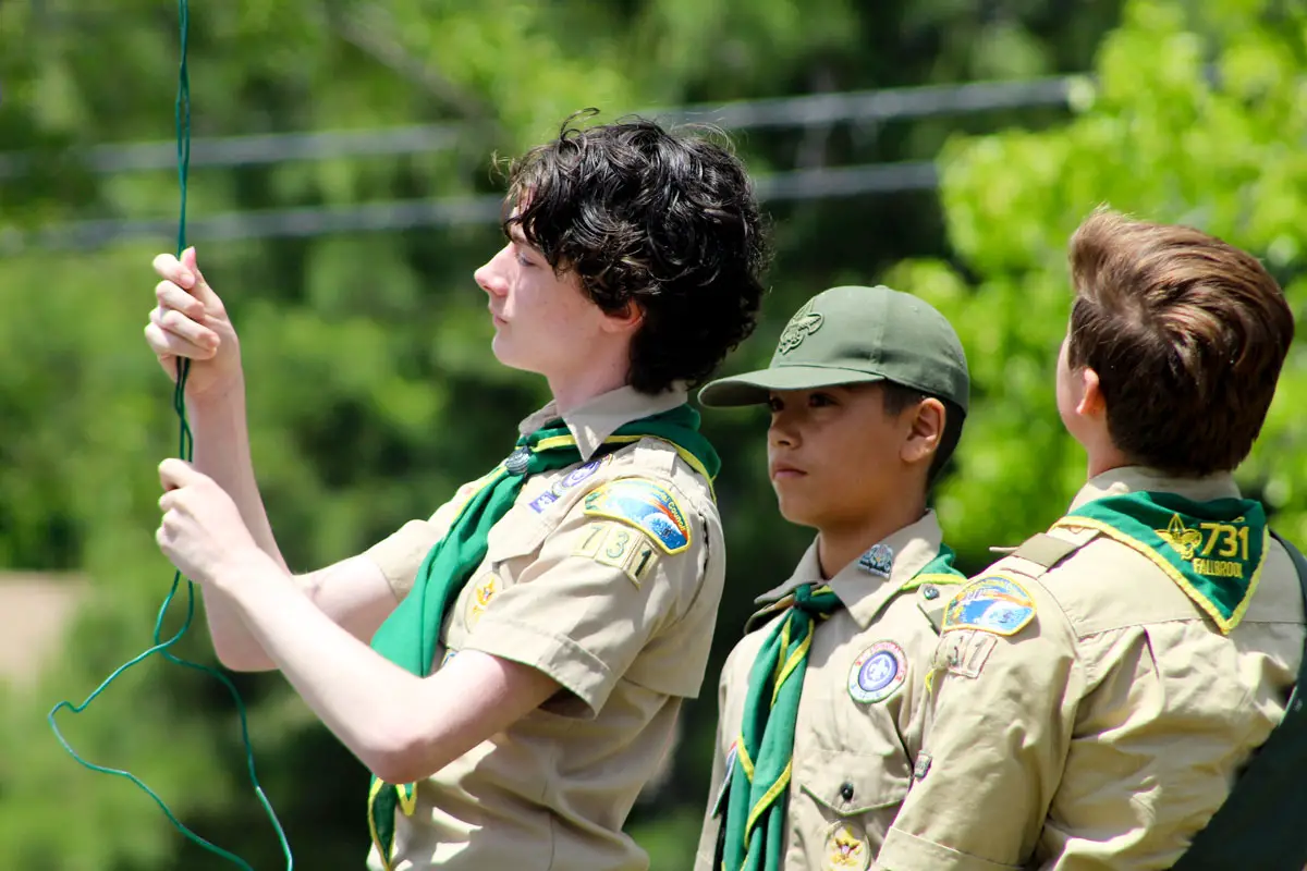Members of Boys Scouts Troop 731 raise the American flag during a Memorial Day ceremony on May 26 in Fallbrook. Photo by Samantha Nelson