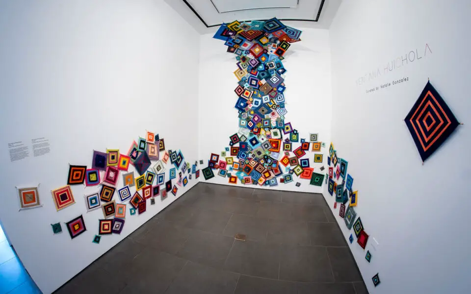 Over 80 North County residents contributed handcrafted tsikuris for "Ventana Huichola," a community installation honoring Huichol traditions. Courtesy photo/OMA