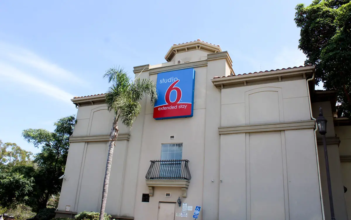 The 98-room Studio 6 hotel at Avenida Encinas and Cannon Road will be converted into housing. Photo by Leo Place