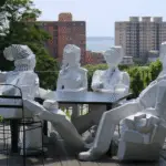 A board of directors represented by generic white avatars sits around a table, concept of indecision
