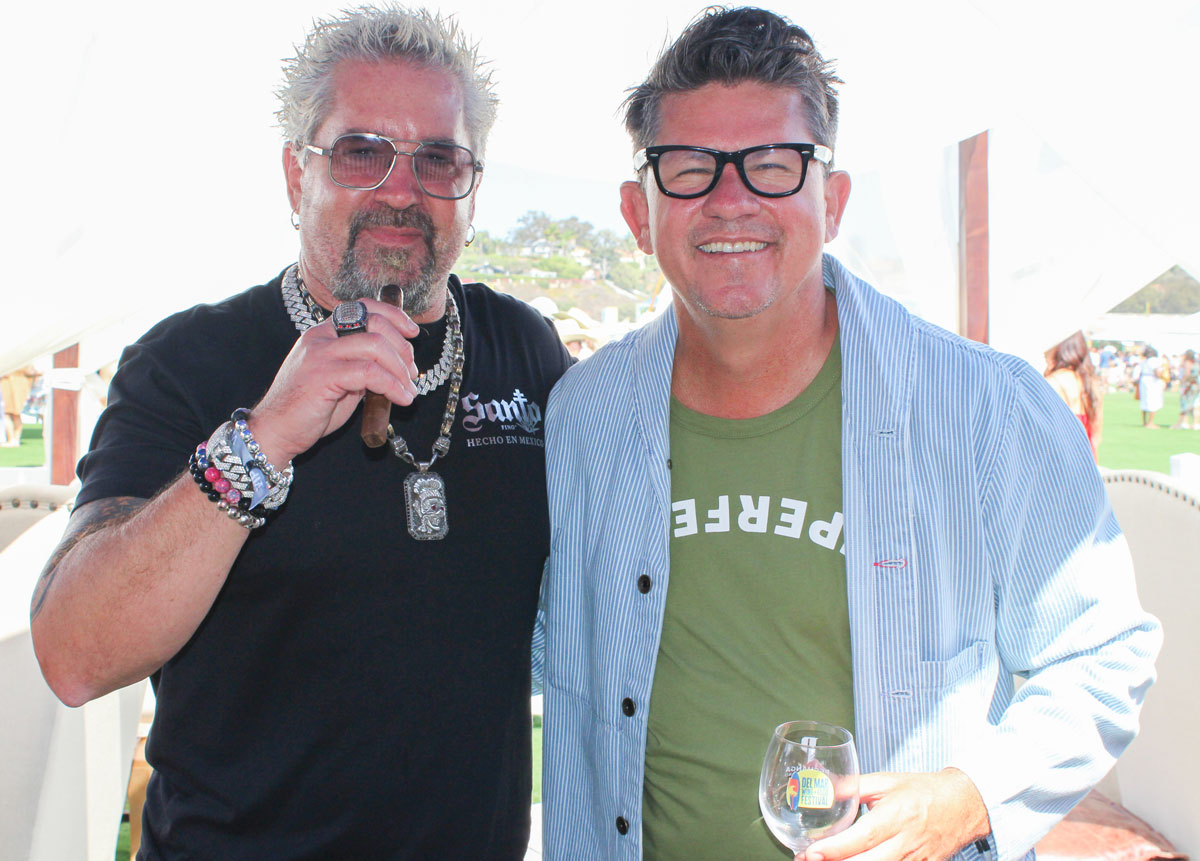 Food Network star Guy Fieri, left, with Food Network personality and Del Mar Wine and Food Festival host Troy Johnson, co-owner of San Diego Magazine. Photo by Rico Cassoni
