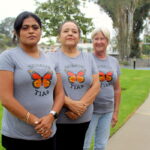 Somos TIAS members (from left) Ana Escamilla, Lisa Montes, and Kathy Faller pictured at La Colonia Park on Aug. 29. Photo by Leo Place