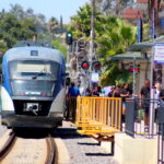 The city of Vista is studying options for a grade separation at the Vista Transit Center on North Santa Fe Avenue, including raising the tracks above the street level to eliminate at-grade crossings. Photo by Leo Place