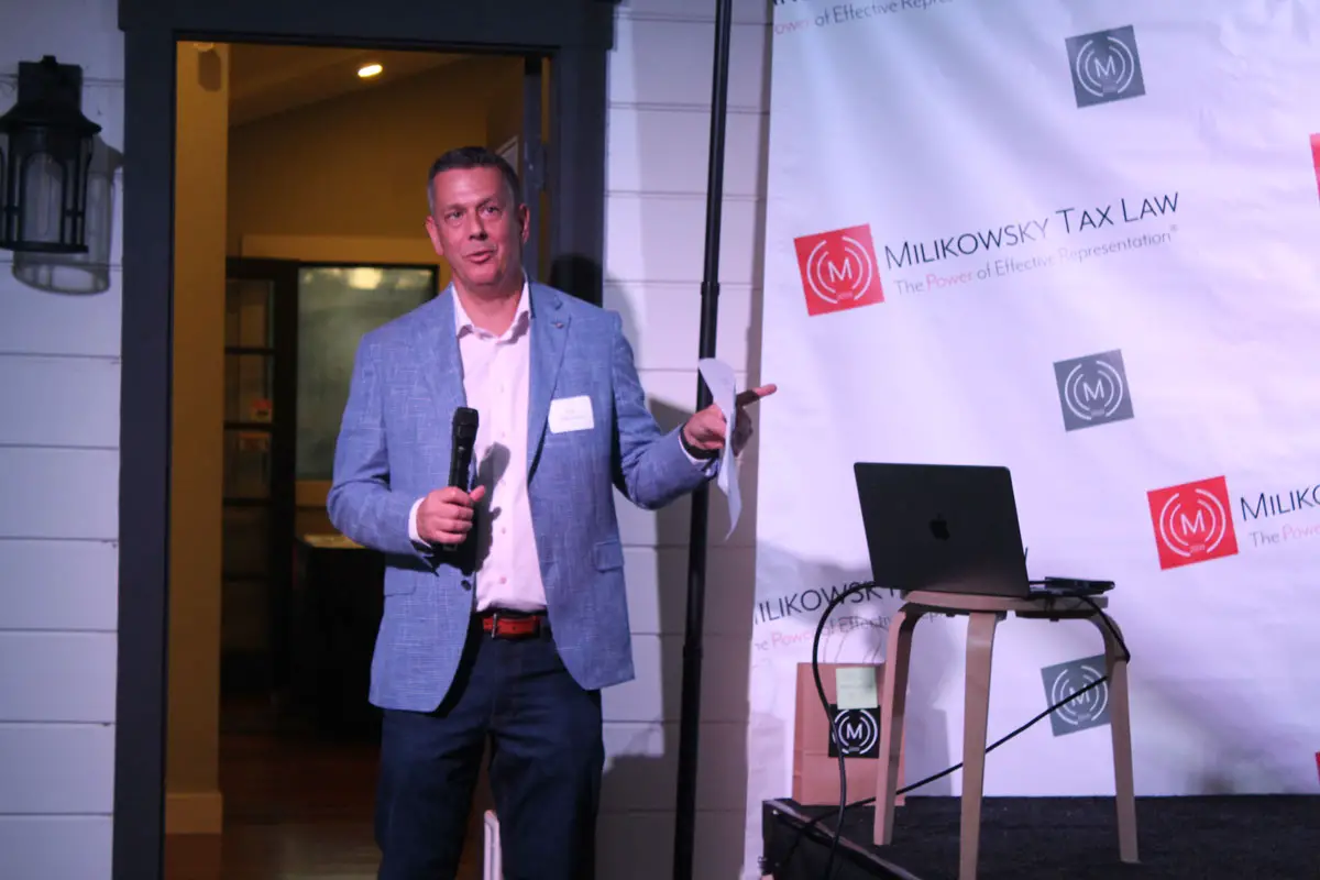 John Milkowski speaks on Sept. 19 at the Milkowsky Tax Law Endurance Event on Friday in Leucadia. Photo by Cameron Adams