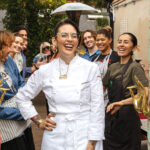 Leu Leu chef Claudette Zepeda and her crew by the doors sourced from an old Egyptian villa. Photo by Kimberly Motos