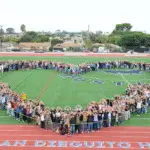 Hundreds of students and staff at San Dieguito Academy gathered in the shape of a heart on Sept. 25 in a demonstration of kindness, in response to a recent antisemitic act on campus. Photo by Edwin Mendoza