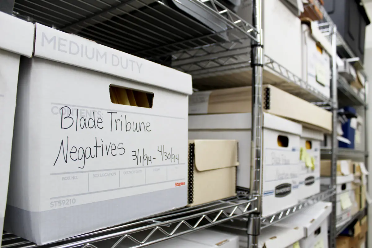 A box of film negatives from the Blade-Tribune newspaper at the Oceanside History Center. Photo by Samantha Nelson