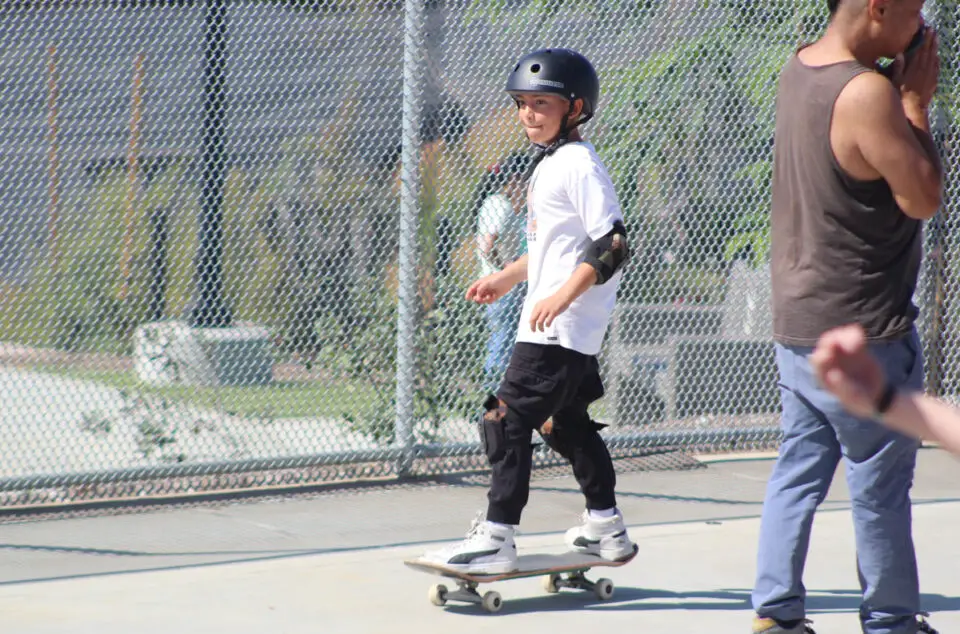 Young skaters roll into the community’s first public skatepark at Village View County Park. Photo by Samantha Nelson