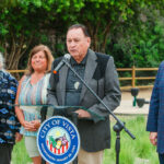 Captain Mal Vernon, Chairman of the San Luis Rey Band of Mission Indians, speaks at the opening of Wíivay Park along Paseo Buena Vista on Monday. Photo by Maria Bowman