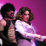 Janet, played by Ava, and Frank-N-Furter, played by Brandon, perform a rendition of Sabrina Carpenter’s song “Thighs” at the Oct. 24 shadow cast performance of “The Rocky Horror Picture Show” at La Paloma Theater in Encinitas. Photo by Leo Place