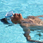 Conway Elementary students learn how to float in the water on Oct. 16 at the Escondido YMCA. Photo by Samantha Nelson