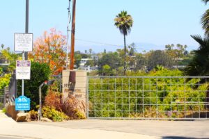 The California Coastal Commission ordered John Levy to remove a code-locked gate along Mountain View Drive that leads to his property as well as to the mouth of the Buena Vista Lagoon and a trail to North Beach. Photo by Leo Place