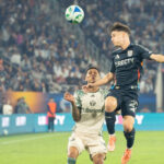 Luca Bombino (27) heads the ball during San Diego FC’s first-ever playoff win over the Portland Timbers on Sunday at Snapdragon Stadium. Photo by Tanya Perez