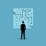 maze graphic, man looking at maze