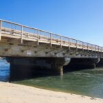 The proposed Camino Del Mar bridge project will make the bridge longer, wider and higher, add a new sidewalk on the east side, and add more pedestrian lookouts. Photo by Leo Place