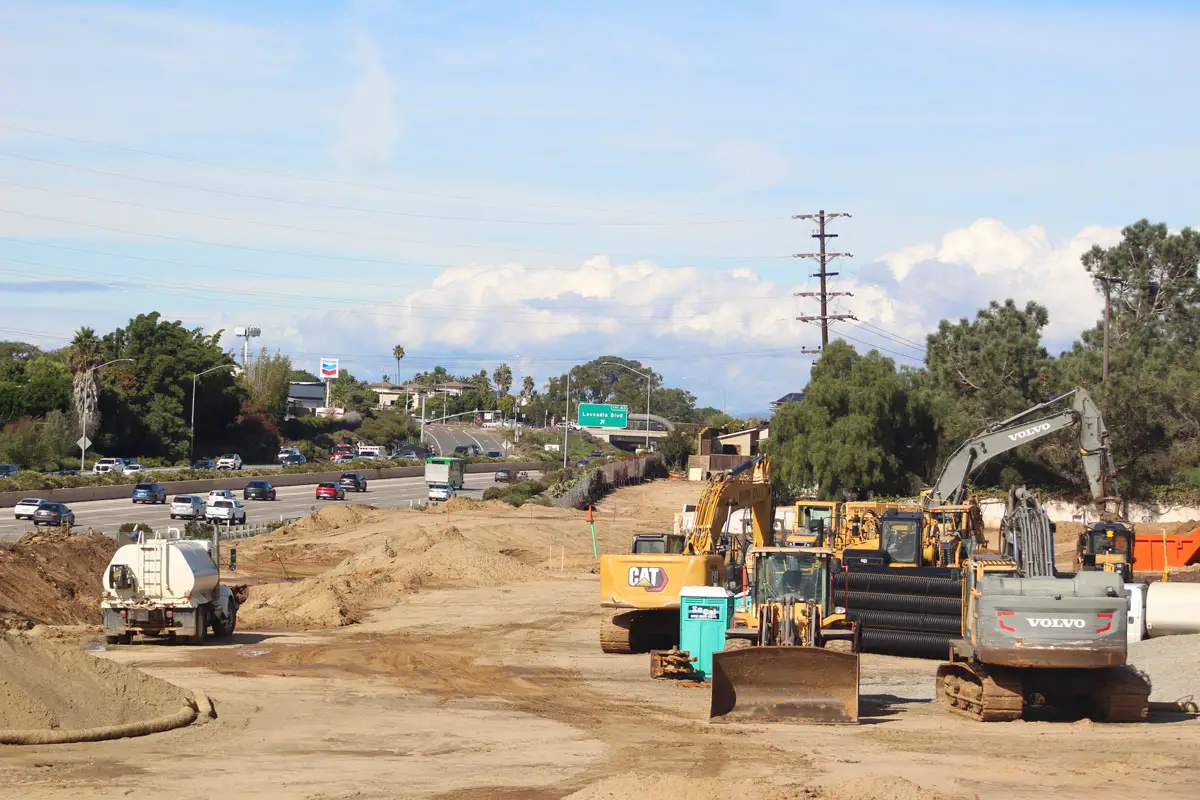 Construction equipment on the southern end of the Clark Avenue Apartments site. Photo by Jordan P. Ingram