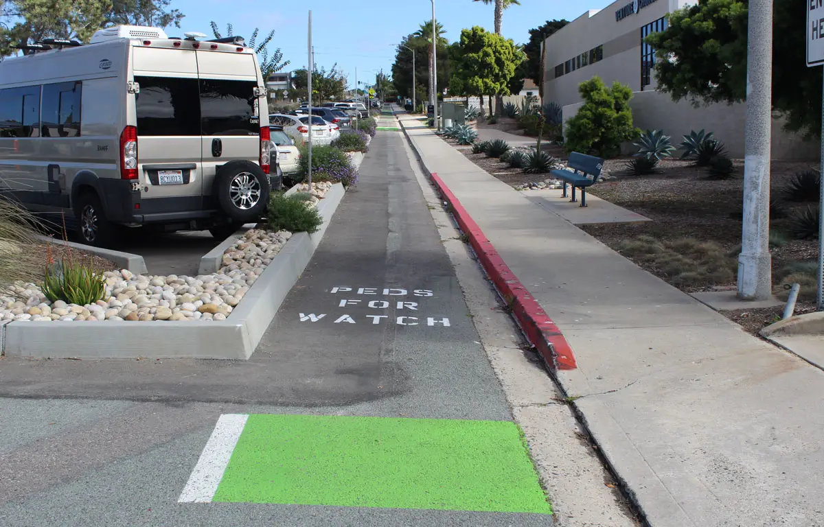 Separated bike lane at Santa Fe Drive near San Dieguito Academy. Photo by Cameron Adams