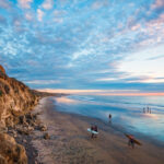 Beachgoers enjoy Terramar Beach in Carlsbad, recently ranked among the nation’s happiest beach cities, according to a new study. Photo by Scott F. McGee