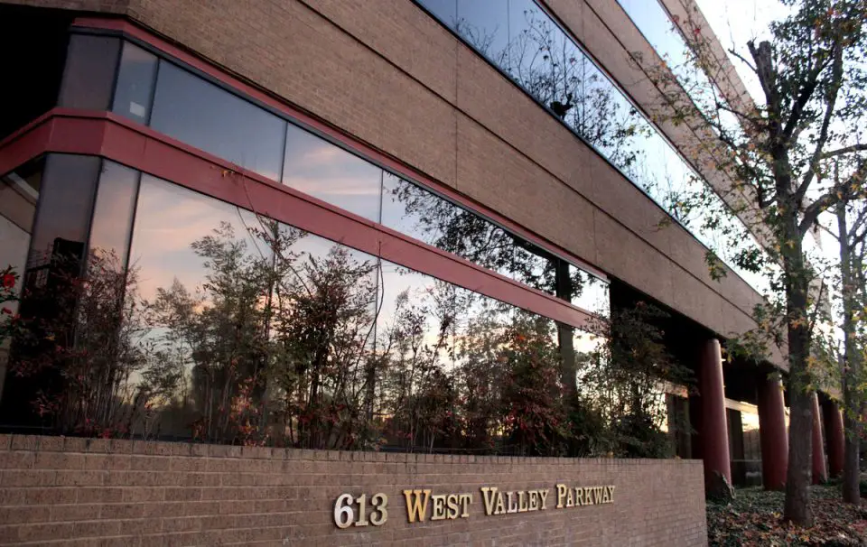 A vacant former office building on West Valley Parkway in Escondido is slated for redevelopment into a 70-unit townhome project. Photo by Samantha Nelson