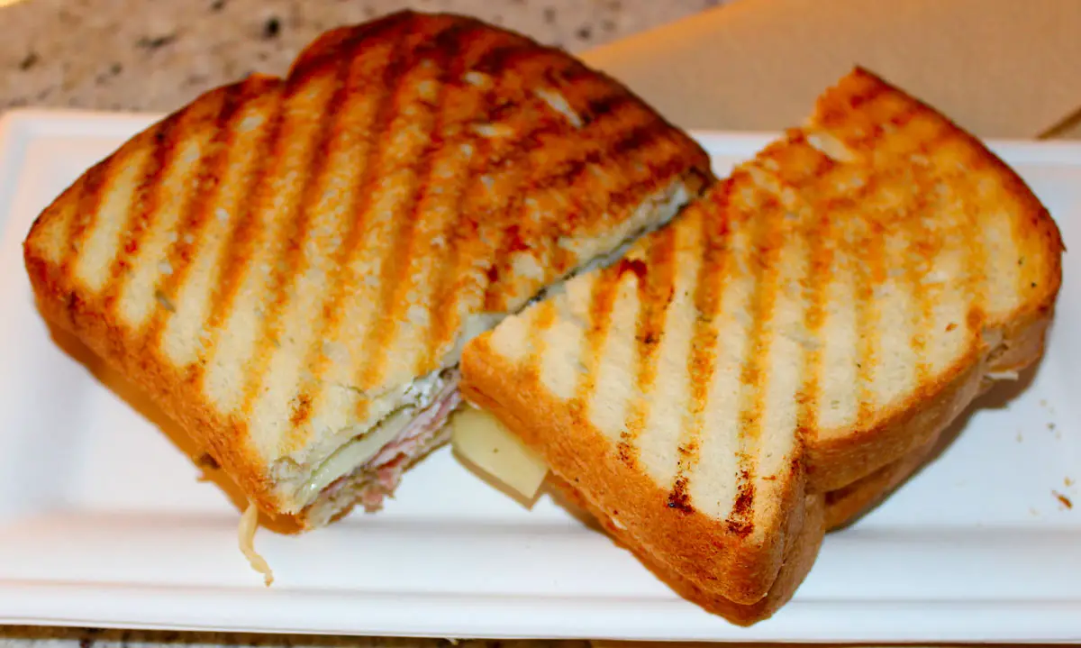 Baked brie and truffle grilled sandwich illustrating Besset’s simple and pure philosophy. Photo by Rico Cassoni