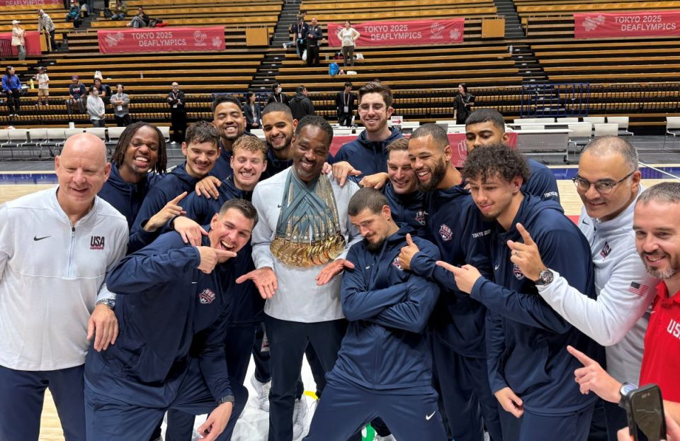 USA Deaf Men's Basketball Team coach David Hamilton, center, celebrates the team's win at the 2025 Deaflympics in Tokyo on Nov. 25. Hamilton is a professor of ASL and Deaf studies at Palomar College in San Marcos. Courtesy photo