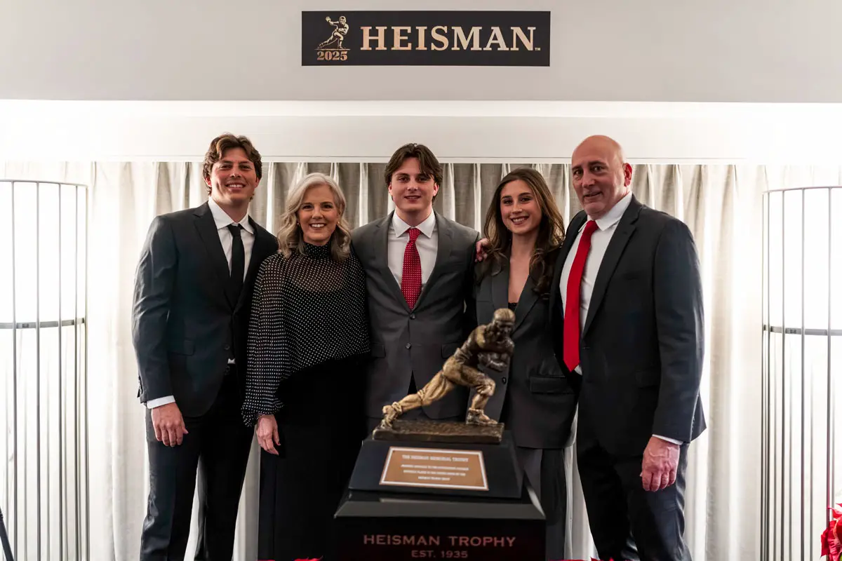 Former Lancer star quarterback Julian Sayin, center, poses for a photo during the Heisman Trophy ceremony on Dec. 13 in New York. Courtesy photo/OSU Football