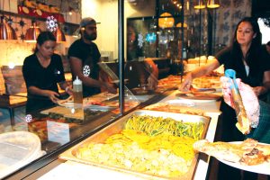 Amalfi Cucina Oceanside stadium kitchen serving pizza, pastas and risottos during their grand reopening. Photo by Rico Cassoni