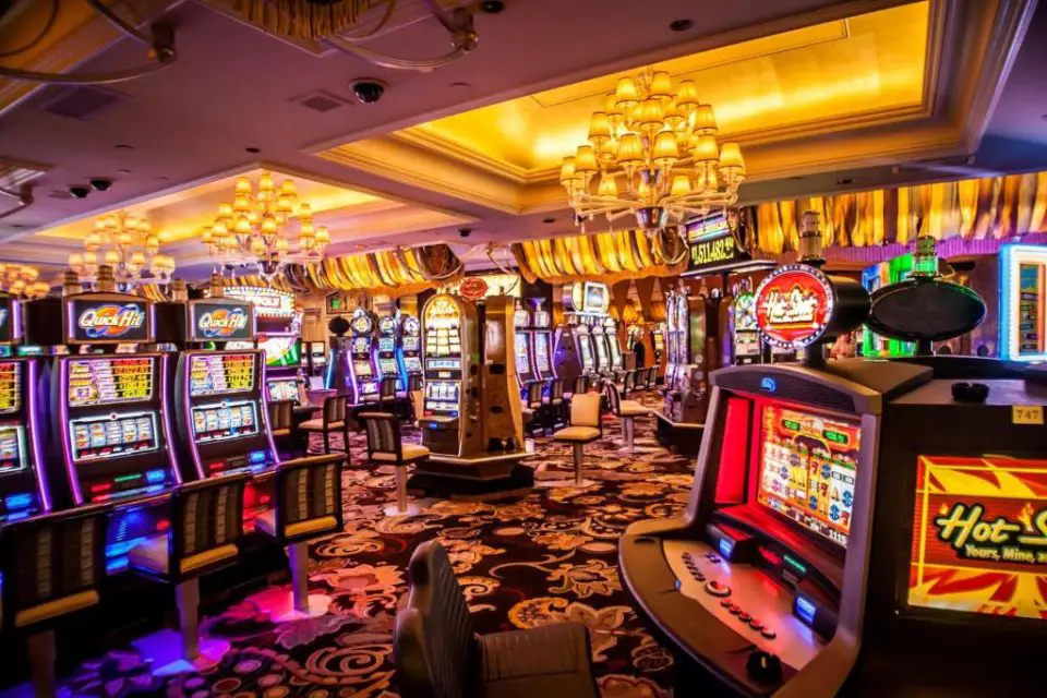 The interior of a casino with slot machines