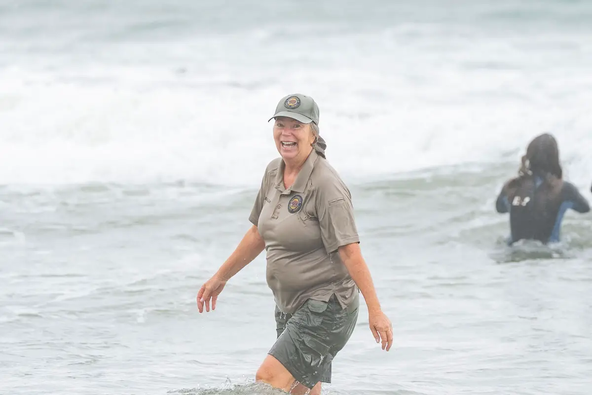 California State Parks employee Anita Balcar takes a chilly dip in the protected marine area where she works on New Year’s Day. Photo by Tanya Perez
