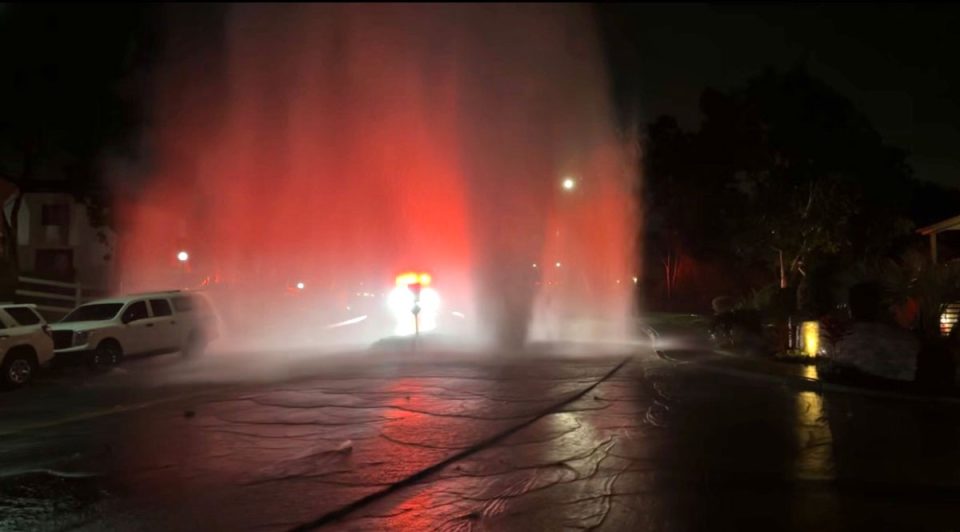 Water shoots into the air after a valve failure in a water main near the intersection of Calle Timiteo and Caminito Malaga in the La Costa area of Carlsbad early Monday. Photo by Gilberto Gonzalez/SoCal News Outlet