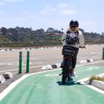 A cyclist rides an e-bike in a protected bike lanes along Coast Highway 101 in Cardiff-by-the-Sea. File photo/Jordan P. Ingram