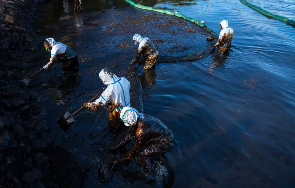 Crews clean up the MV Wakashio oil spill off the southern coast of Mauritius, an island nation in the Indian Ocean. Courtesy photo