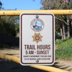 A sign marks the beginning of a trail system that borders the proposed site of the Zona Gale Estates subdivision along Via Cantebria in Encinitas. Photo by Jordan P. Ingram