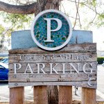 The entrance to a city-owned parking lot in Carlsbad Village. Photo by Cameron Adams