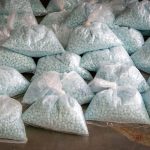 A large seizure of fentanyl pills from the Arizona border, similar to the type and quantity of seizures in California. Photo by Jerry Glaser