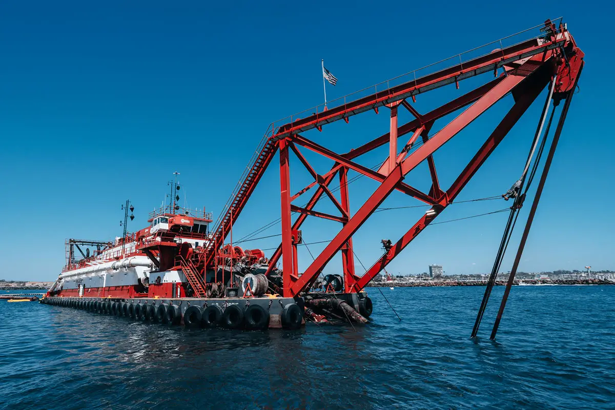 An industrial dredge pumps sand from the harbor onto Oceanside beaches. Courtesy photo/City of Oceanside
