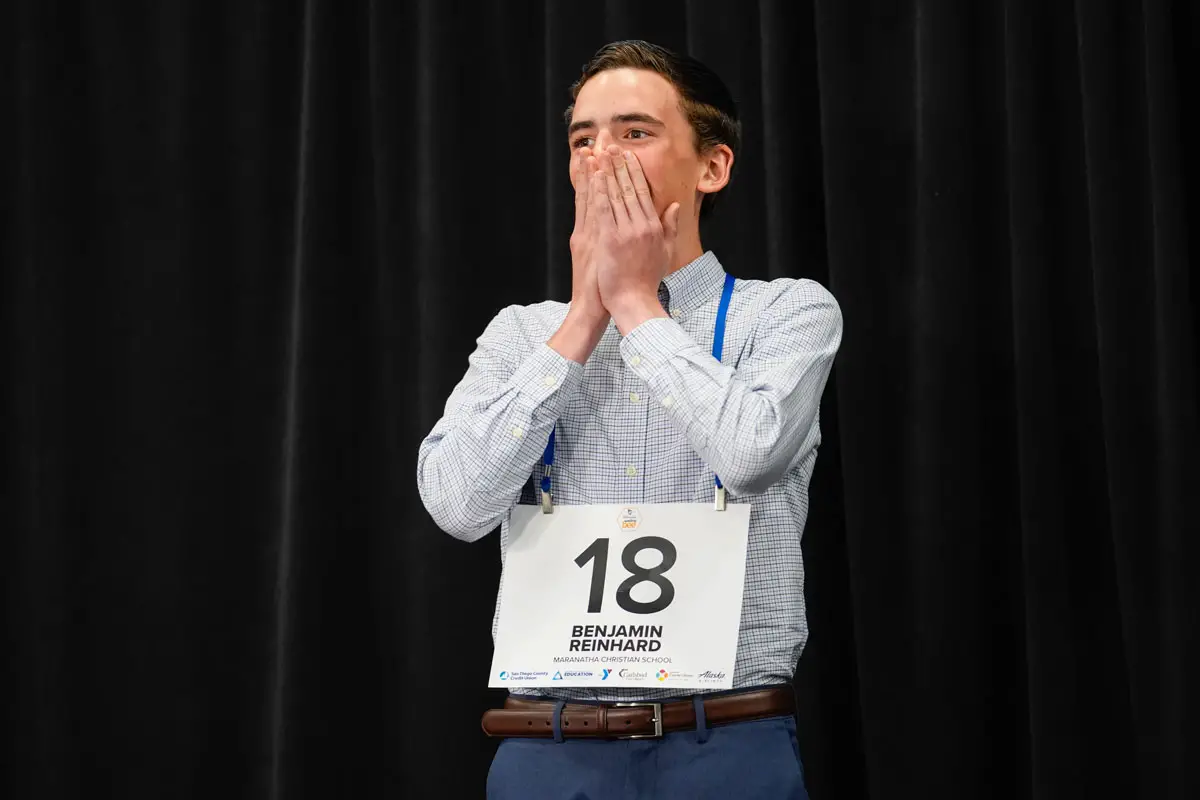 Benjamin Reinhard reacts after correctly spelling “kenosis” to win the San Diego County Scripps Regional Spelling Bee in the 23rd round on March 10 at the Jackie Robinson Family YMCA in San Diego. Photo courtesy San Diego County Office of Education