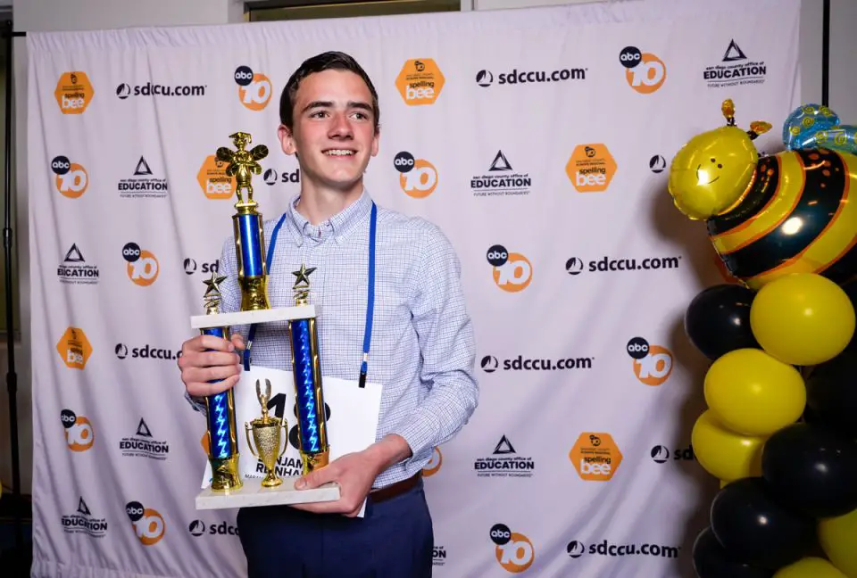 Benjamin Reinhard, an eighth-grader from Maranatha Christian School in 4S Ranch, holds the trophy after winning the San Diego County Scripps Regional Spelling Bee on March 10 in San Diego. Photo by SDCOE