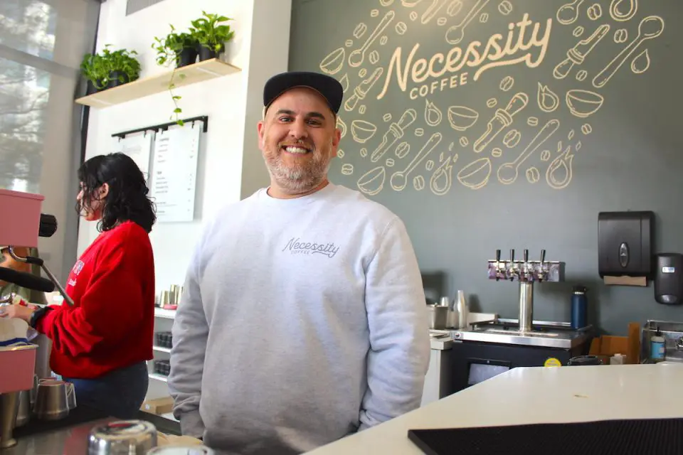 Necessity Coffee founder Jon Runion pictured Tuesday at the new San Marcos North City location at 250 North City Drive, which opened on March 7. Photo by Leo Place
