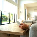 Owners of homes with large sliding doors or west-facing windows are using motorization to schedule shades to close during peak heat hours. Courtesy photo
