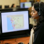 A San Diego County Sheriff’s Office dispatcher works in the agency’s communications center. The department recently launched an AI system to route non-emergency calls. Courtesy photo/Sheriff's Office