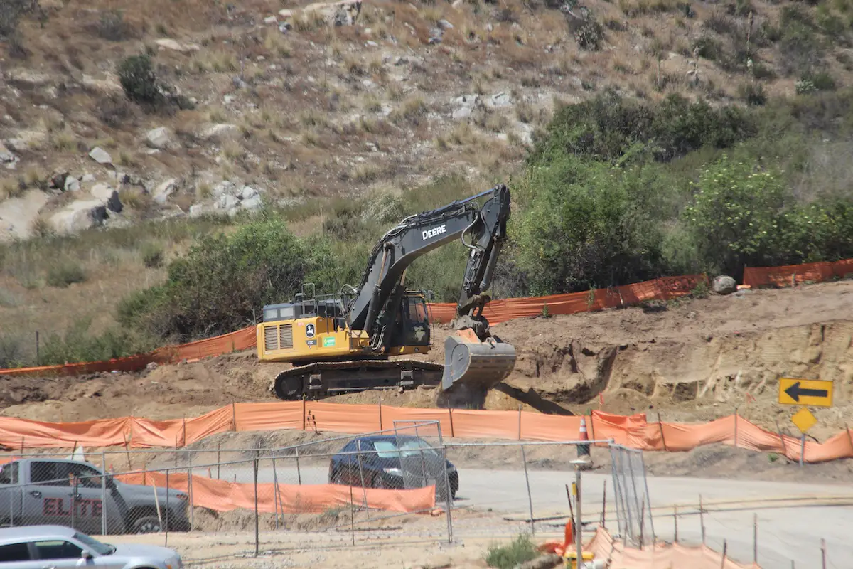 Excavator on property of Nutmeg Homes. Photo by Cameron Adams