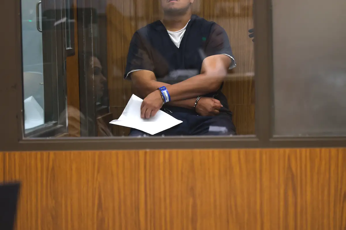 A judge ordered a mental competency evaluation for Luis Alvarado, who has been charged with arson and murder following the deaths of Micahel and Kathy Austin in a San Marcos house fire, in Vista Superior Court on Thursday. His face was also ordered to be obscured. Pool photo/John Gastaldo, San Diego Union-Tribune