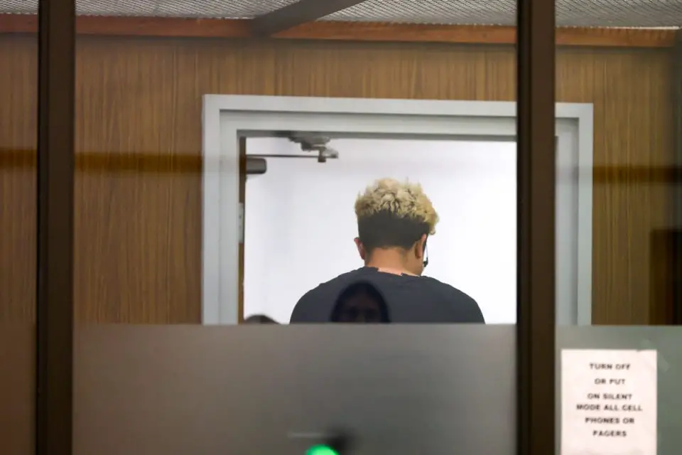 Luis Alvarado, charged with arson and murder in a deadly San Marcos house fire, appears in Vista Superior Court on Thursday, where a judge ordered a mental competency evaluation and that his face be obscured. Pool photo/John Gastaldo, San Diego Union-Tribune