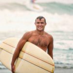 Encinitas icon Don Hansen, founder of Hansen Surfboards. Original photo by Tom Keck/Colorized with AI