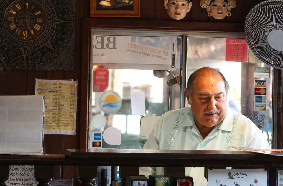 Ray Rincon Jr. works at the front of Tony’s Jacal on April 18 while celebrating the restaurant’s 80th anniversary. His grandparents, Tony and Catalina Gonzalez, opened the Mexican eatery in 1946. Photo by Leo Place