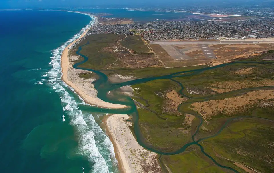 An aerial view of the Tijuana Slough and San Diego Bay national wildlife refuges near the U.S.-Mexico border. Photo by Ralph Lee Hopkins